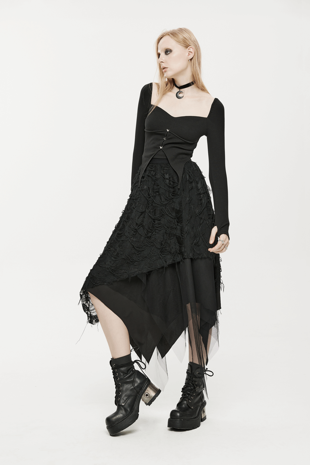 Gothic ripped butterfly asymmetrical mesh skirt styled with edgy black top and combat boots, perfect for punk fashion lovers.