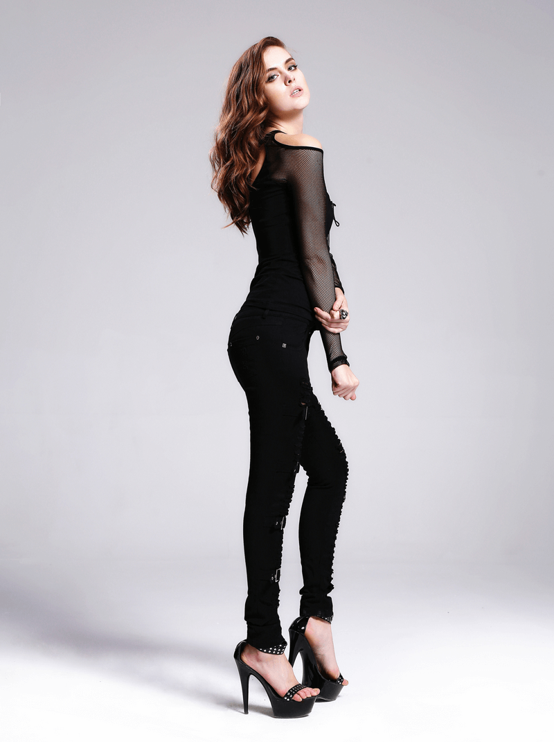 Gothic ripped black pants with buckles, styled in a chic steampunk look, perfect for casual wear.