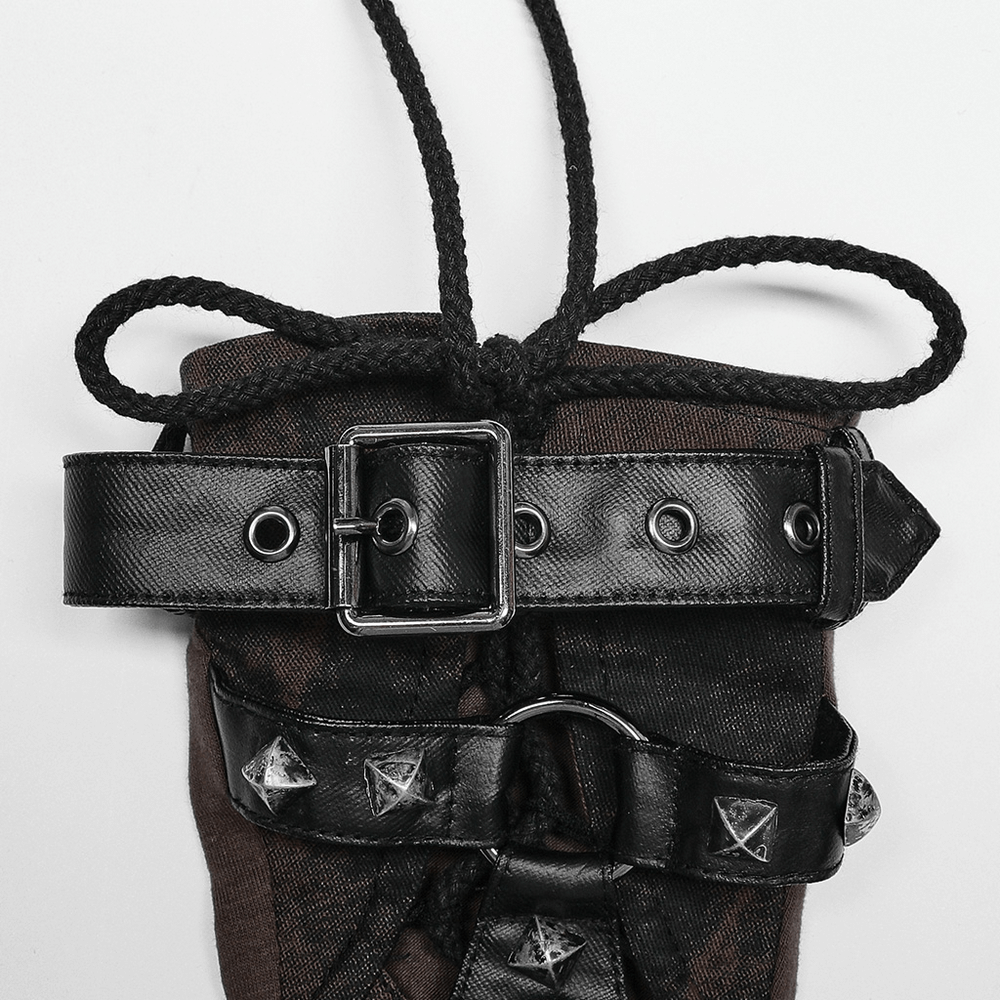 Close-up of Gothic fingerless gloves featuring metal studs and adjustable leather straps for an edgy punk style.
