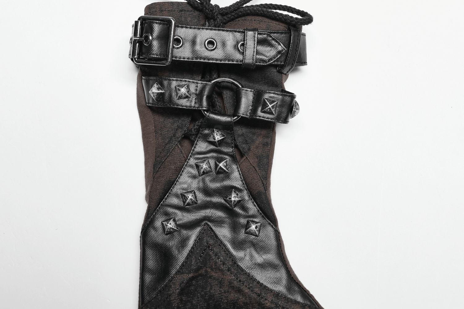 Edgy gothic boot featuring studded design and buckle details for a punk-inspired look.