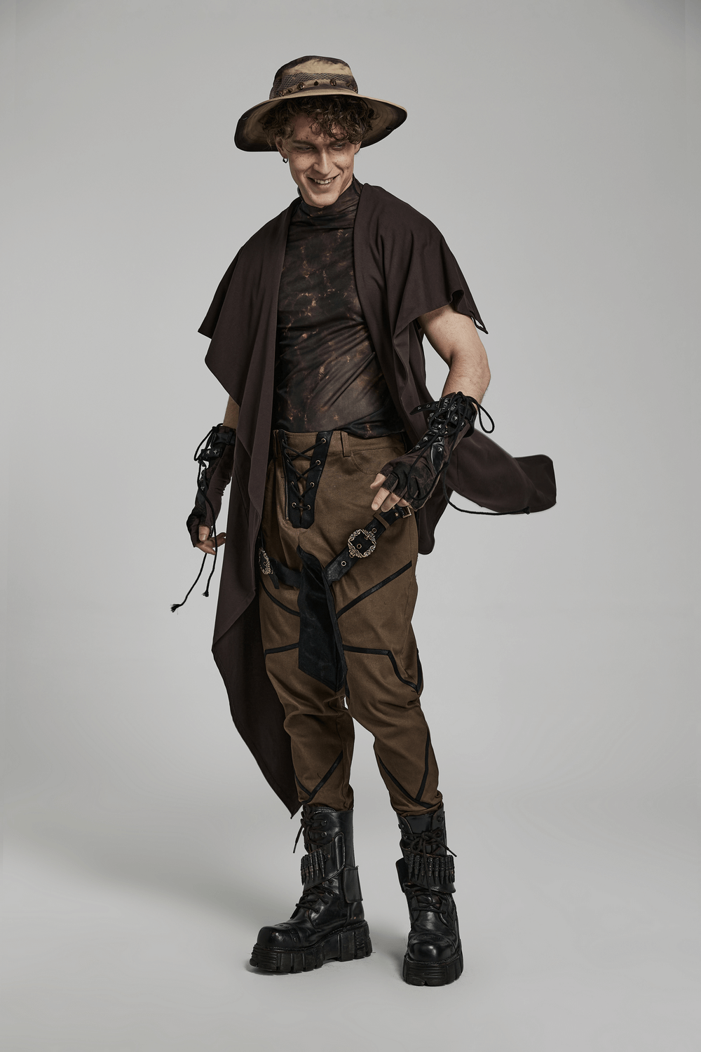 A model showcasing edgy punk fashion with fingerless gloves, stylish top, and statement accessories.