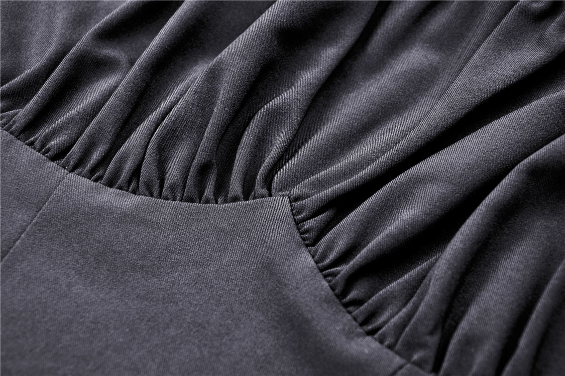 Close-up of the elegant draped fabric on a Gothic romance off-the-shoulder dress, highlighting its luxurious texture.