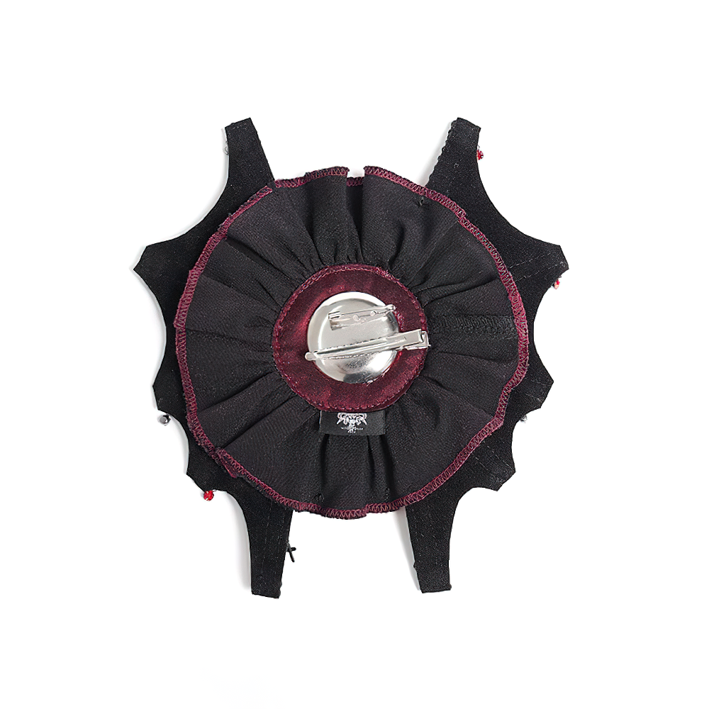 Gothic rose cross hair clip with spider web and skull detail, perfect for alternative and punk hairstyles.