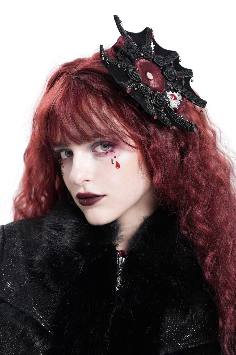 Gothic rose cross hair clip featuring spider web and skull, styled with dark romantic hair and makeup.