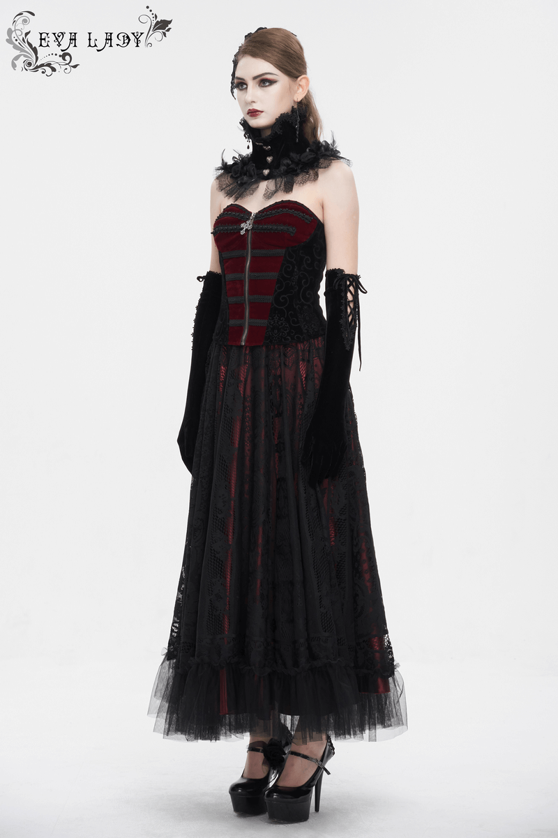 Elegant gothic dress featuring lace trim, heart-shaped buttons, and feather neckwear, perfect for bold fashion statements.