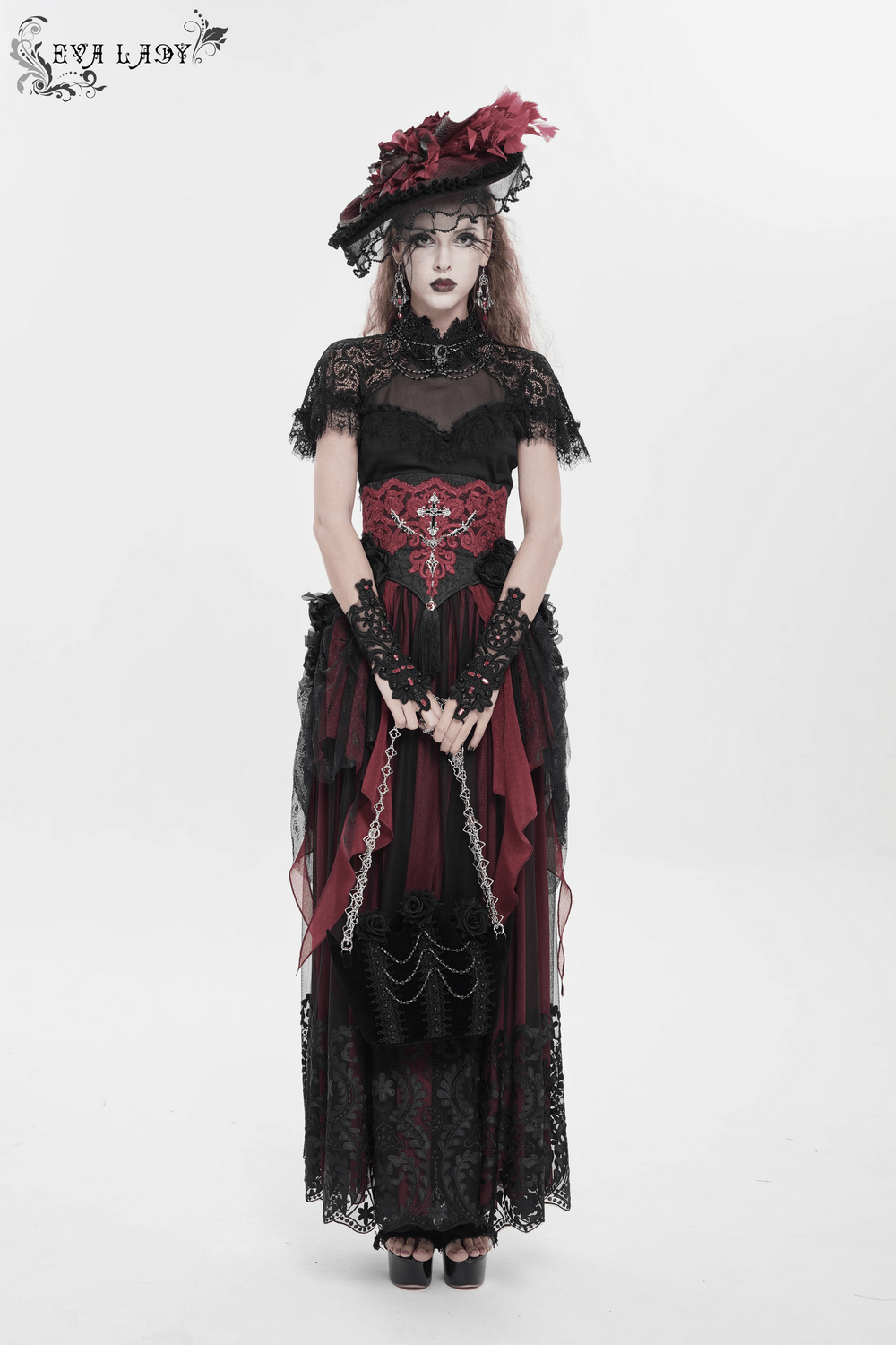 Alt Tag: Gothic Rose Velvet Handbag with Pearl Chains and Lace styled with dark gothic lace dress, red corset details, and dramatic hat