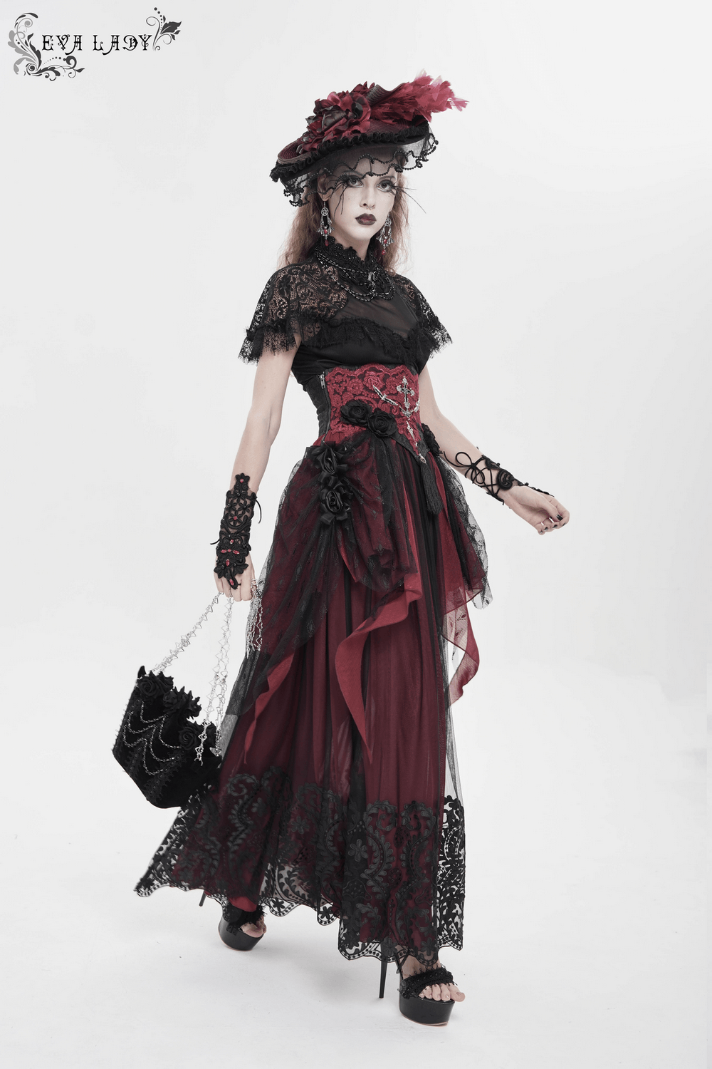 Gothic Rose Velvet Handbag with Pearl Chains and Lace carried by model in black lace and burgundy gothic dress, dark romantic evening look