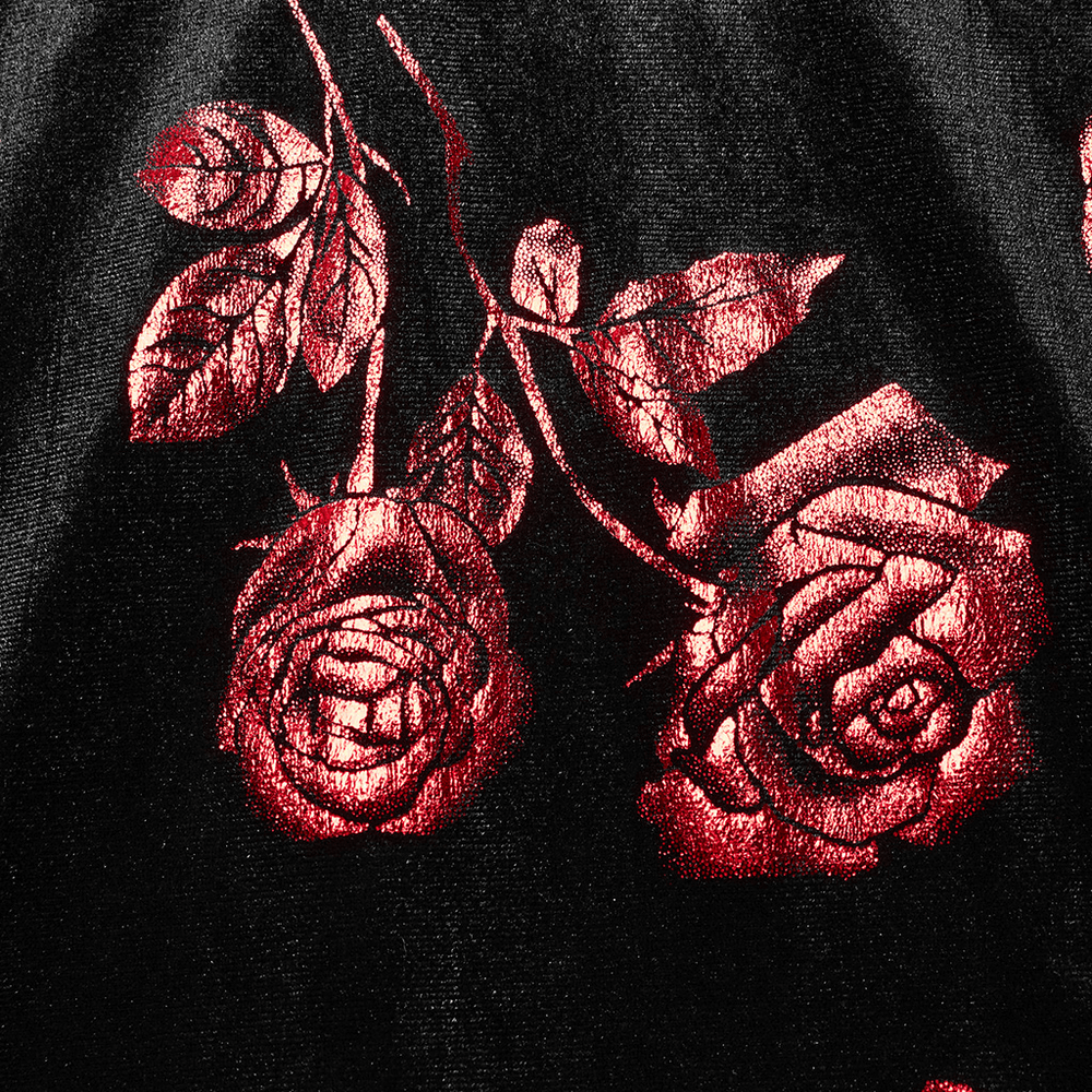Gothic velvet fabric featuring vibrant red roses and intricate leaves pattern, perfect for a bold style.