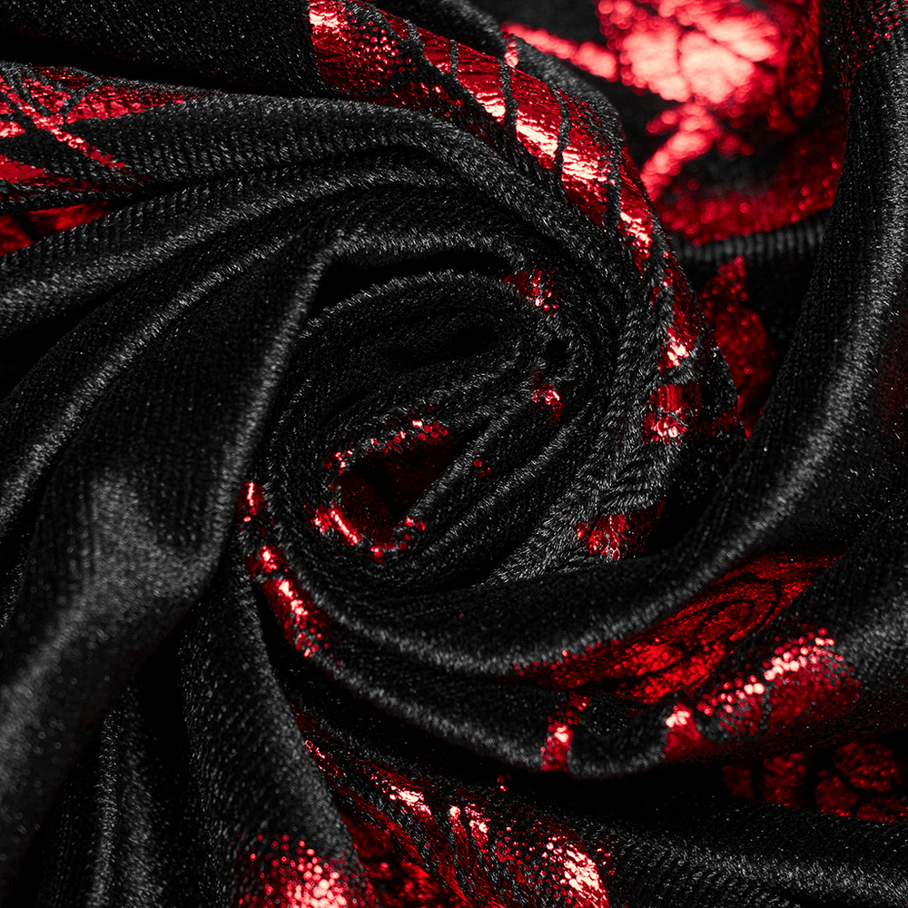 Close-up of luxurious black and red floral velvet fabric, showcasing a Gothic roses pattern in rich colors.