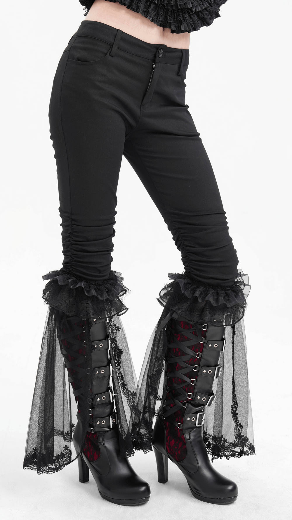 Gothic ruched pants with lace and tulle flare hem, paired with striking oversized lace-up boots for an elegant alternative fashion look.