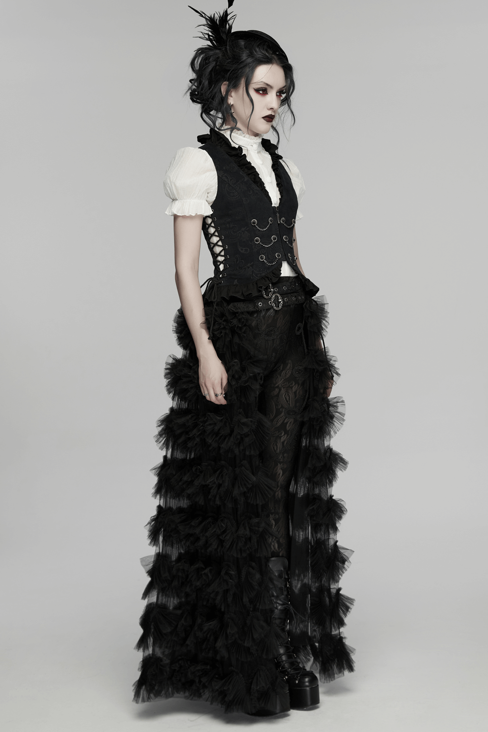 Gothic Ruffle Chain Waistcoat with Adjustable Drawstrings on a model, showcasing dramatic ruffles and chains.
