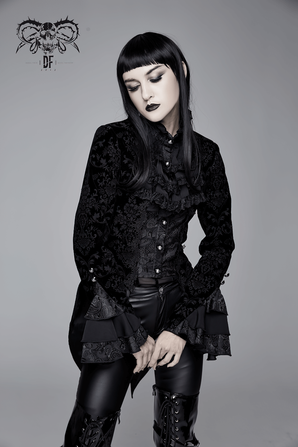 Gothic ruffle jacket with lace sleeves, perfect vintage style for women, exudes dark elegance in black.