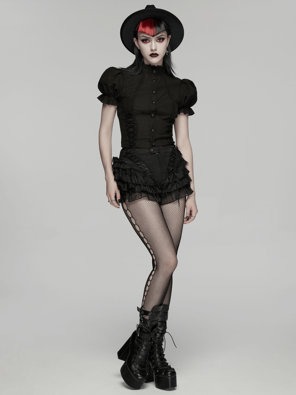 Gothic Ruffle Lace Cake Shorts with Diagonal Drawstrings worn with fishnet stockings and a stylish hat.