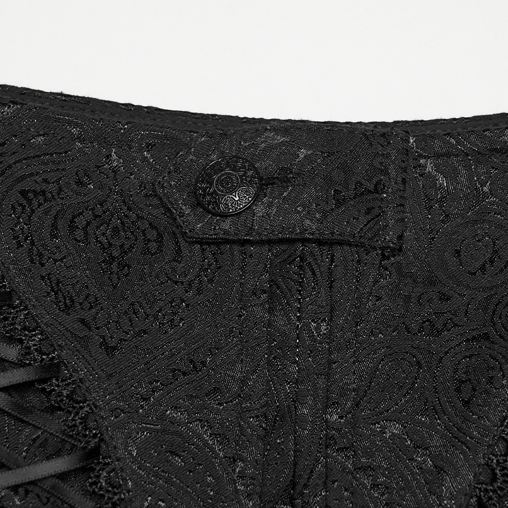 Close-up of the fabric detail on Gothic Ruffle Lace Cake Shorts with Diagonal Drawstrings showcasing intricate patterns.