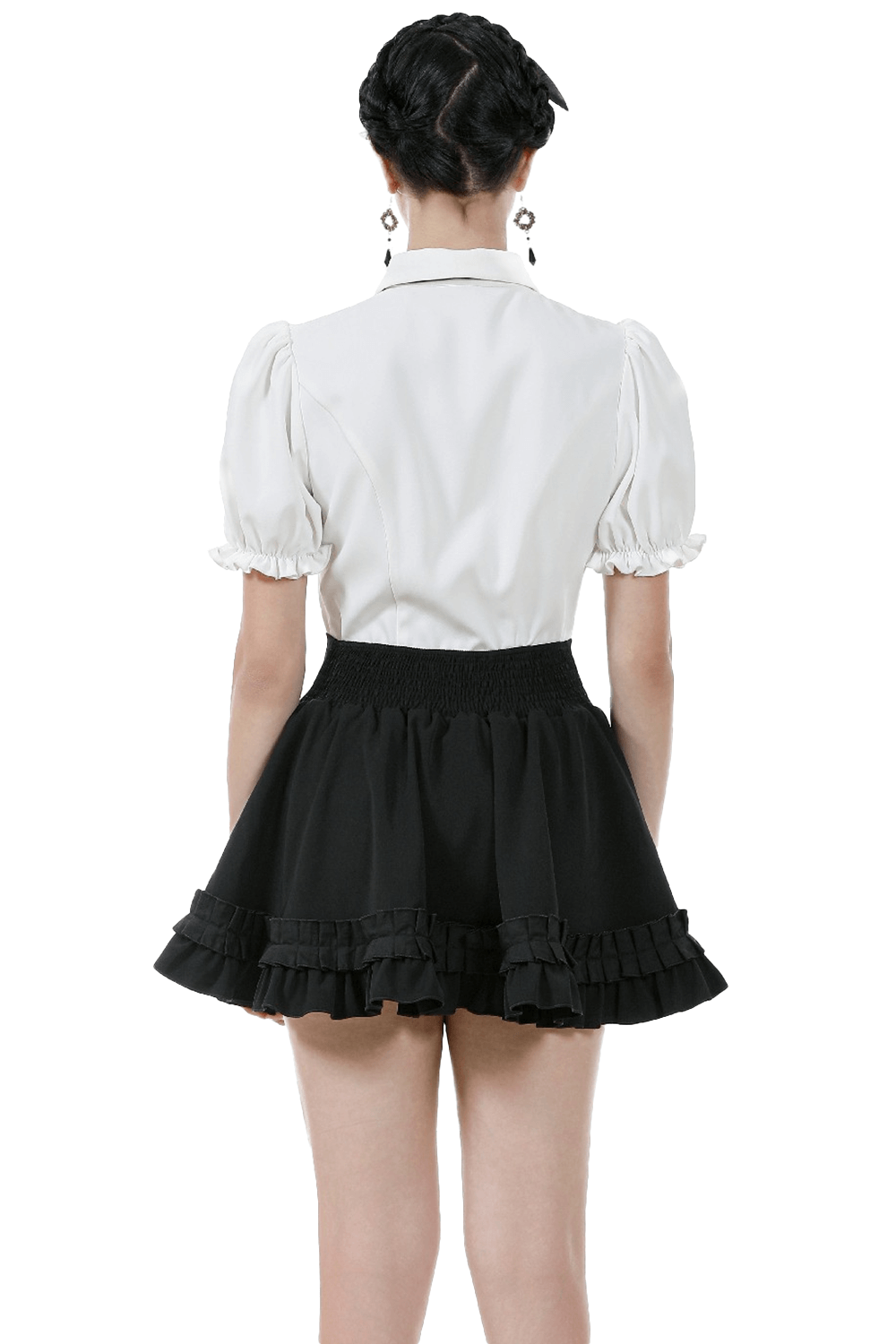 Back view of a model wearing a short Gothic ruffle mini skirt with a white puff-sleeve blouse and an elastic waistband.