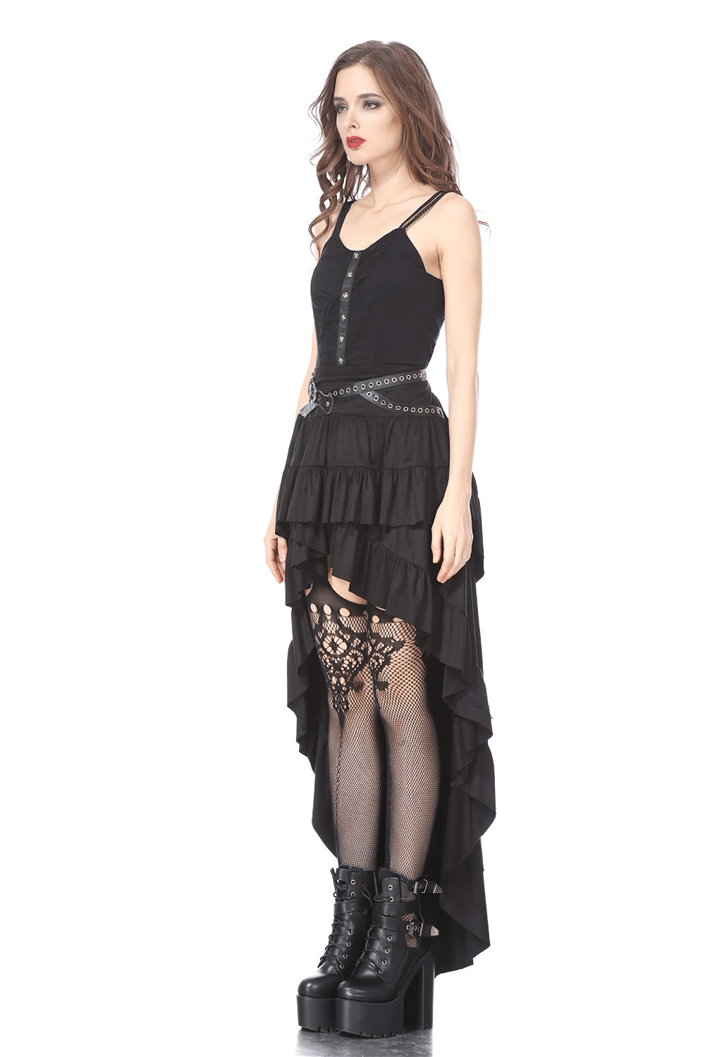 Gothic ruffled skirt with studded belt, layered ruffles, and fishnet details, paired with edgy platform boots.