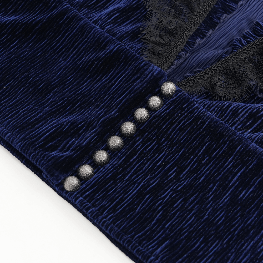 Close-up of Gothic ruffled velvet shirt featuring lace detailing and decorative pearls.