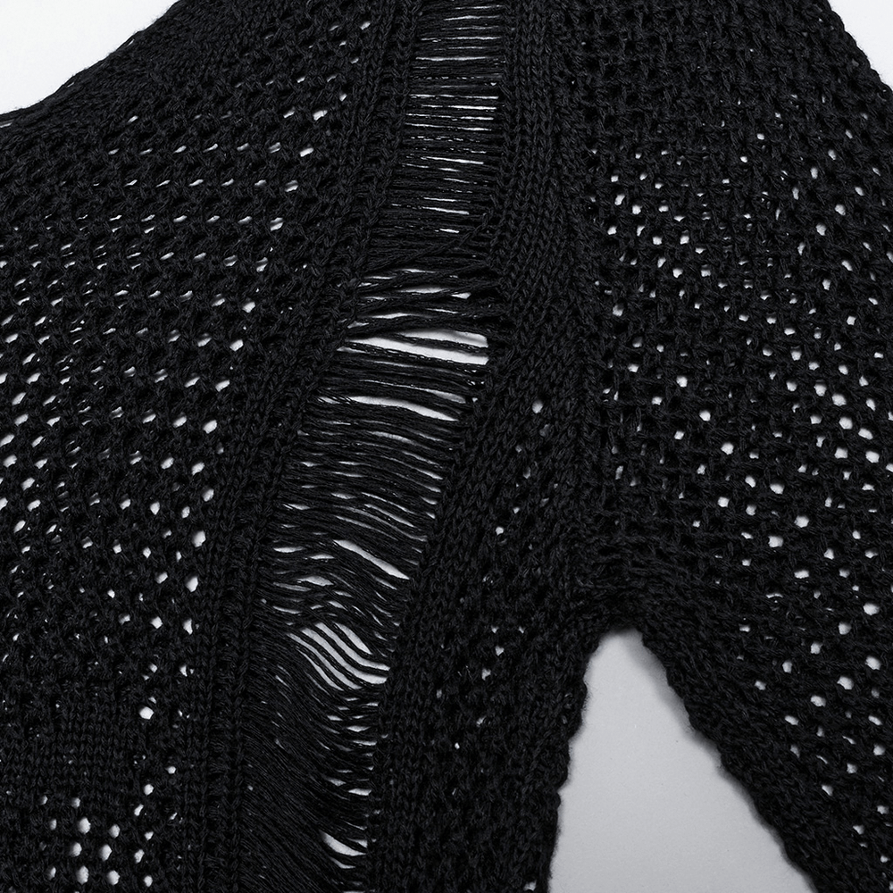 Close-up of gothic black skull knit mesh dress showcasing intricate woven texture and sheer fabric detail.