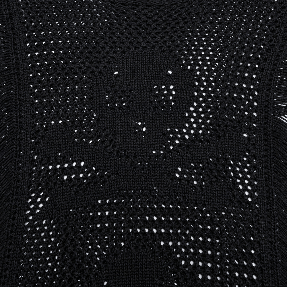 close-up of gothic black knit mesh fabric featuring a bold skull design, perfect for edgy punk fashion enthusiasts.