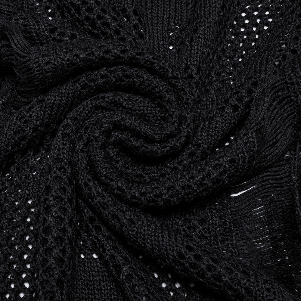 Close-up of soft black knit fabric with intricate mesh patterns, perfect for Gothic and punk fashion.