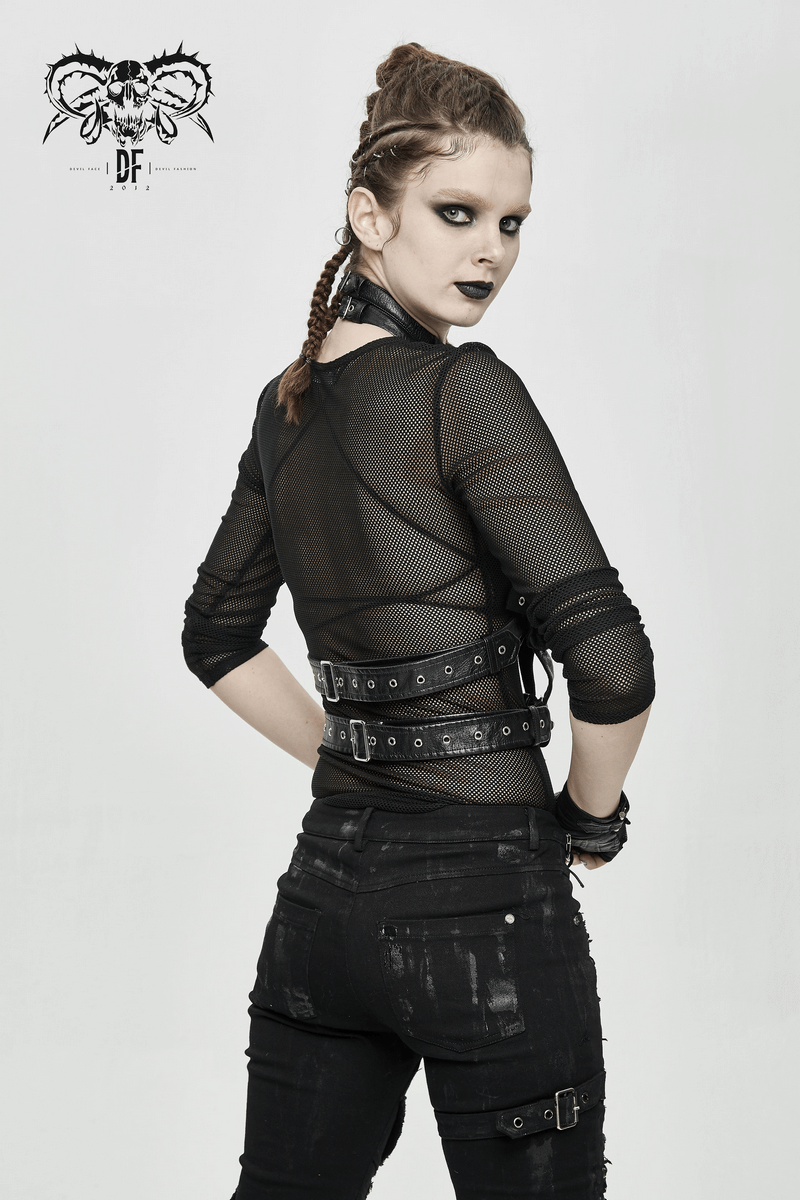 Gothic woman wearing a mesh top and faux leather bondage harness for a stylish, edgy look.
