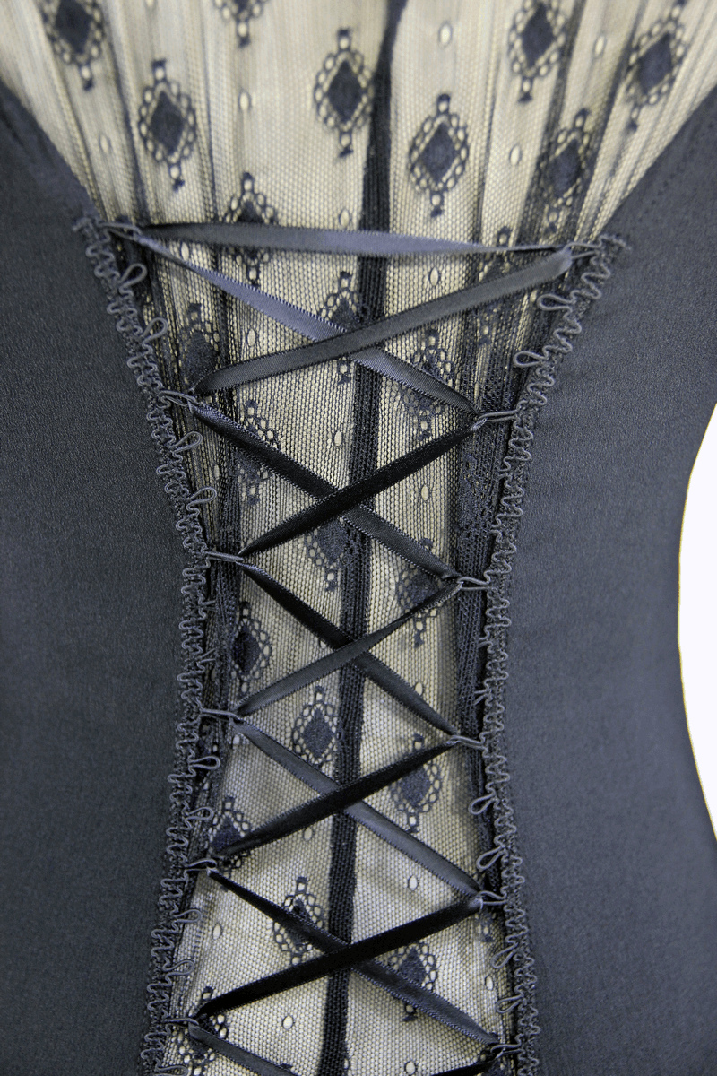 Close-up of the lace-up back design on a women's gothic black blouse with intricate beading details.