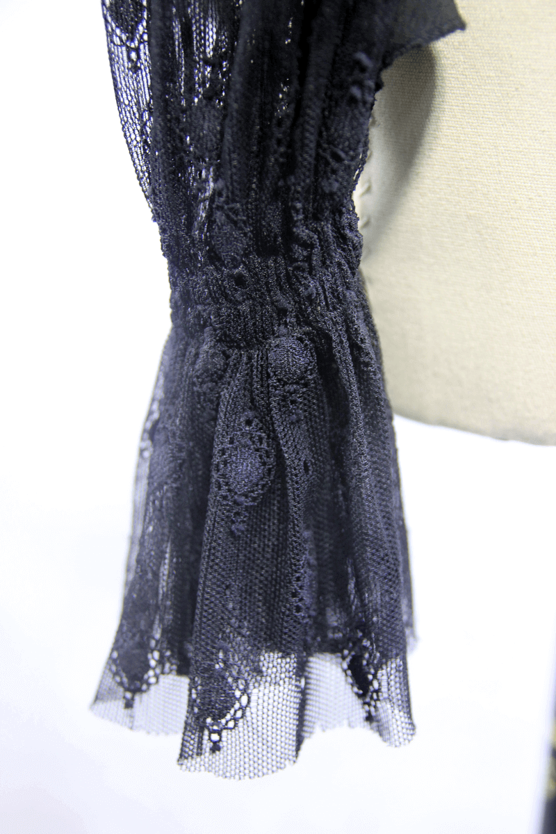 Black lace sleeve detail of a Gothic sexy blouse with elegant beading and vintage cut.