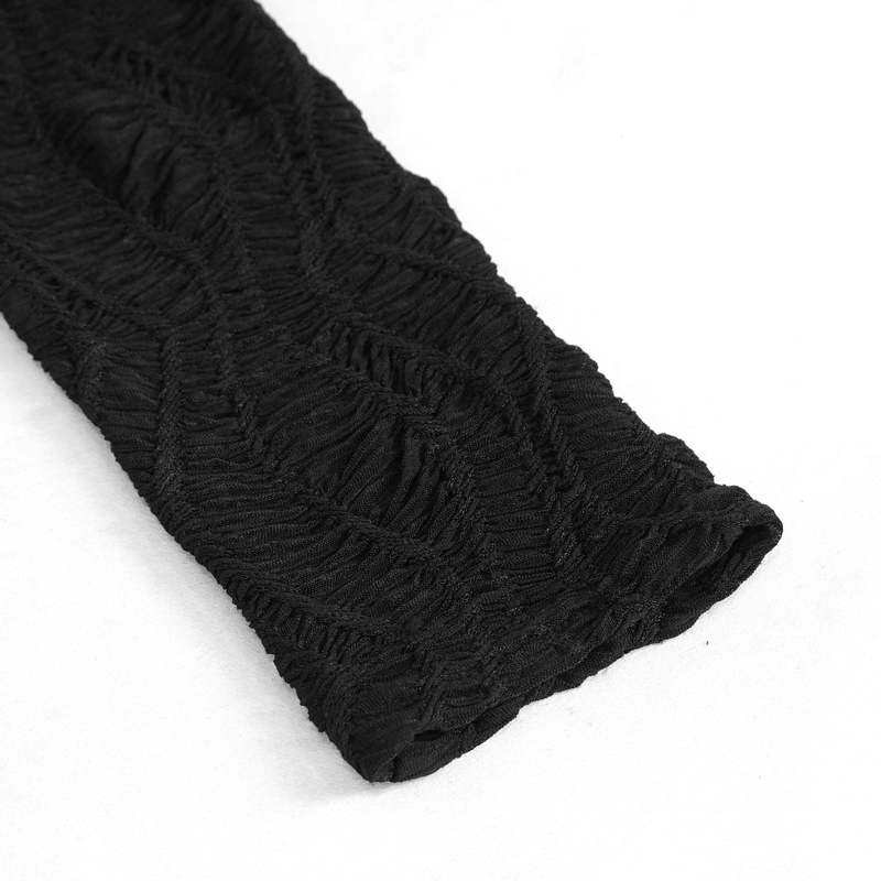Close-up of black fabric detailing showcasing textured long sleeve for gothic crop top.
