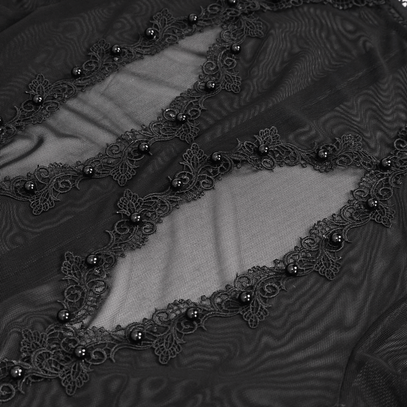 Close-up of black transparent dress fabric with intricate lace and bead detailing, perfect for gothic fashion.