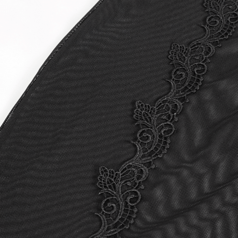 Close-up of elegant black transparent fabric with intricate lace detailing for a gothic dress.