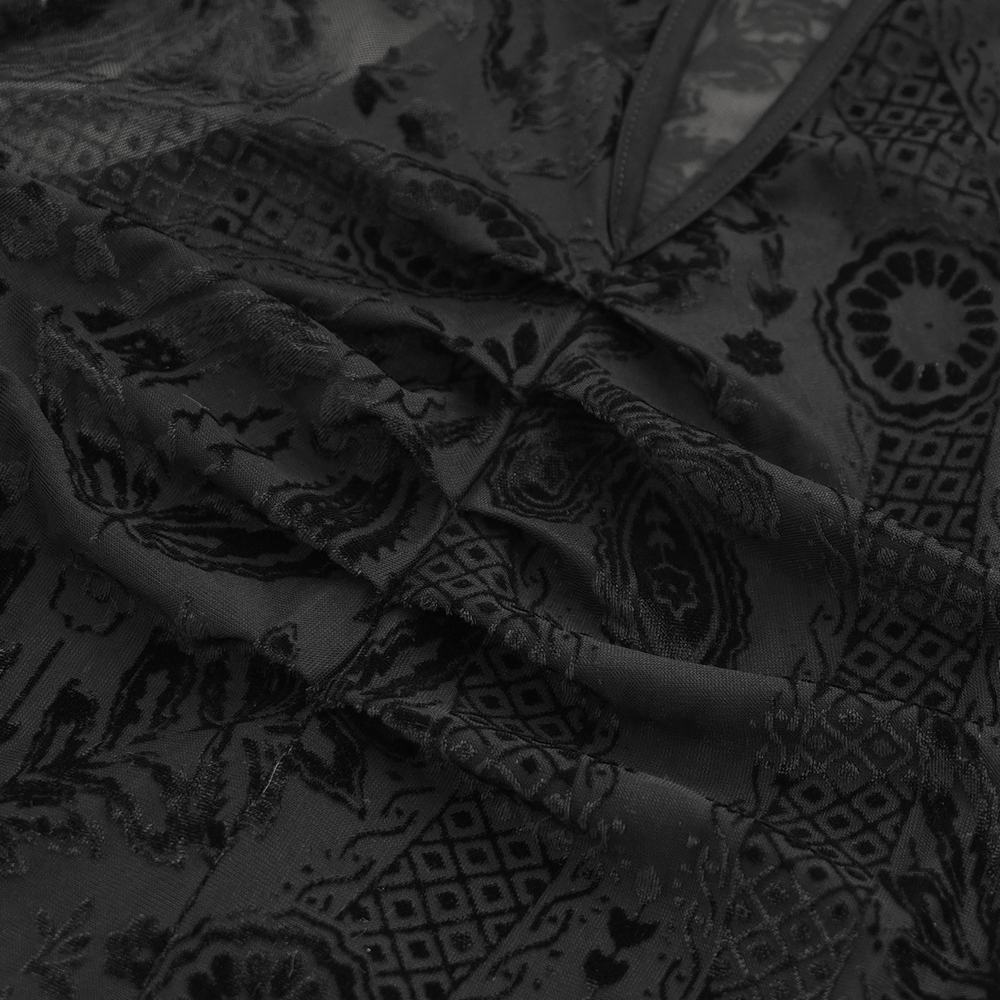 Close-up of elegant black mesh fabric with intricate floral embroidery, perfect for gothic fashion.