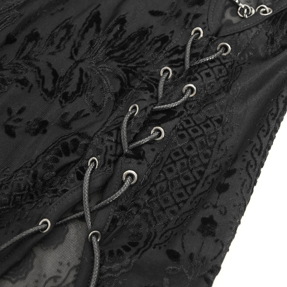 Detailed view of gothic sheer black dress showcasing floral embroidery and lace-up detailing.