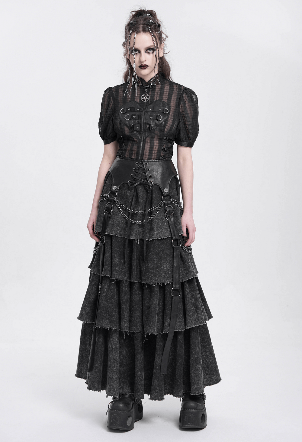 Gothic sheer black blouse with pentagram charm, lace-up sides, and layered skirt for alternative fashion.