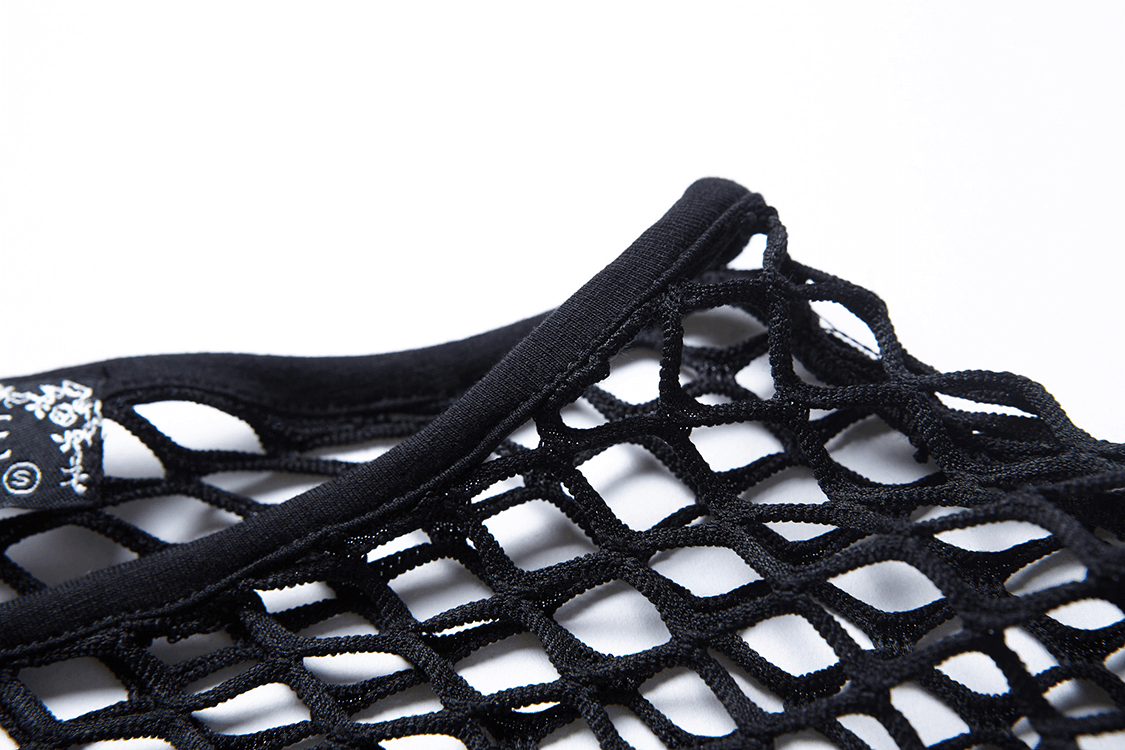 Close-up of gothic sheer black mesh top showcasing intricate lace design and neckline details.