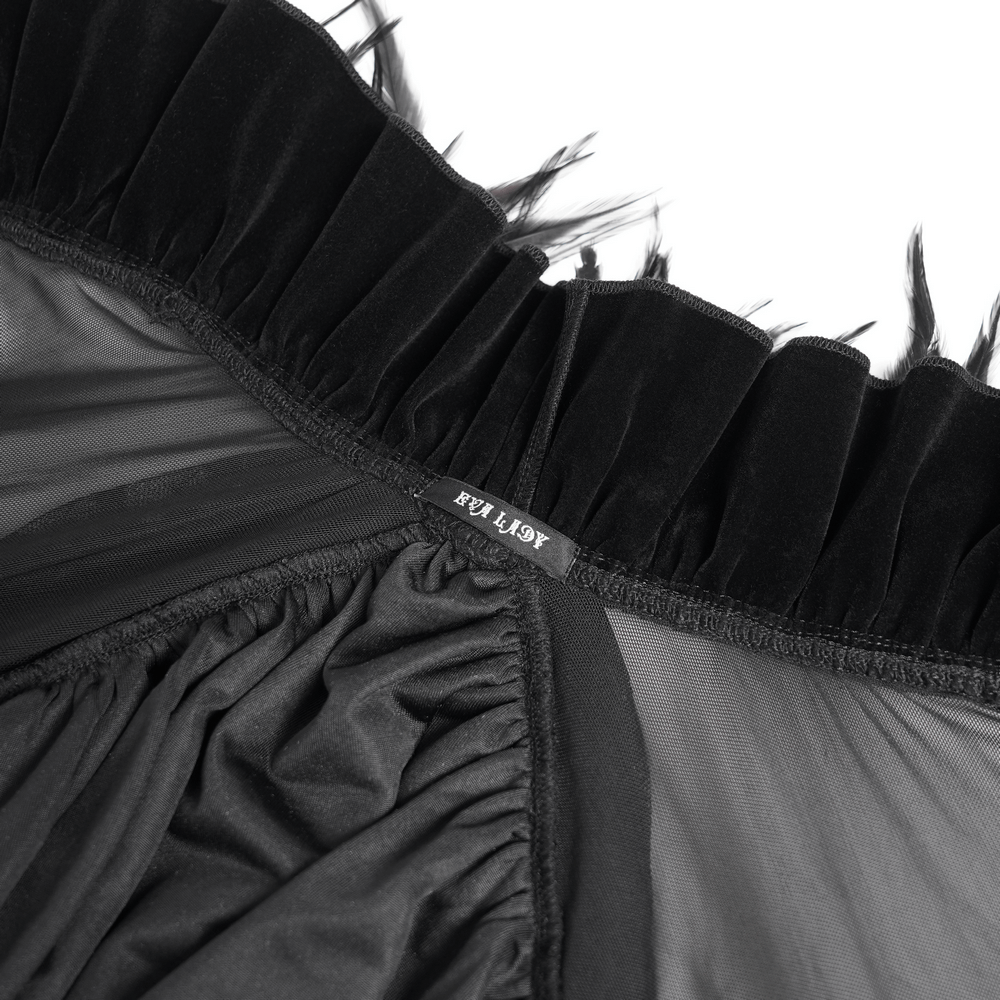 Gothic sheer mesh shrug interior with ruffles and feather trim, showcasing elegant lace detailing.