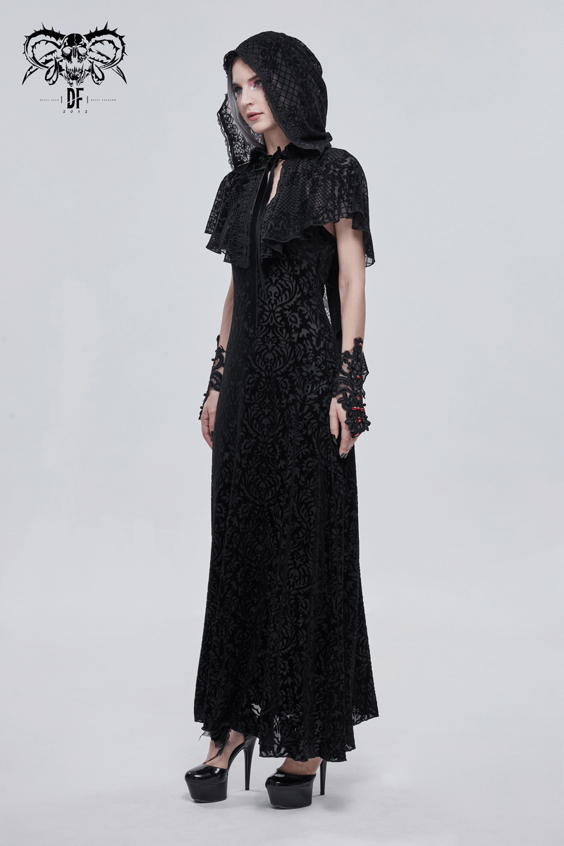 Women's gothic black hooded cape with floral print, paired with stylish platform shoes and elegant accessories.