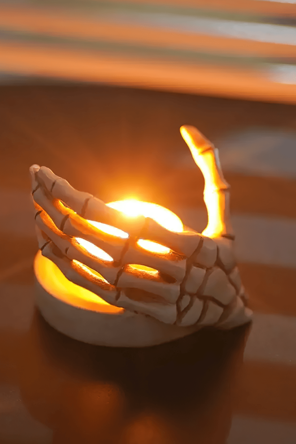 Gothic Skeletal Hand Candle Holder for Dark Decor elevating spooky ambiance with candlelight.
