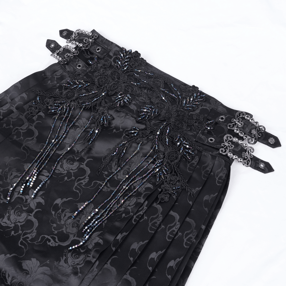 Gothic black skirt with intricate embroidery, embellishments, and butterfly motifs on waistband for a dramatic, elegant look.