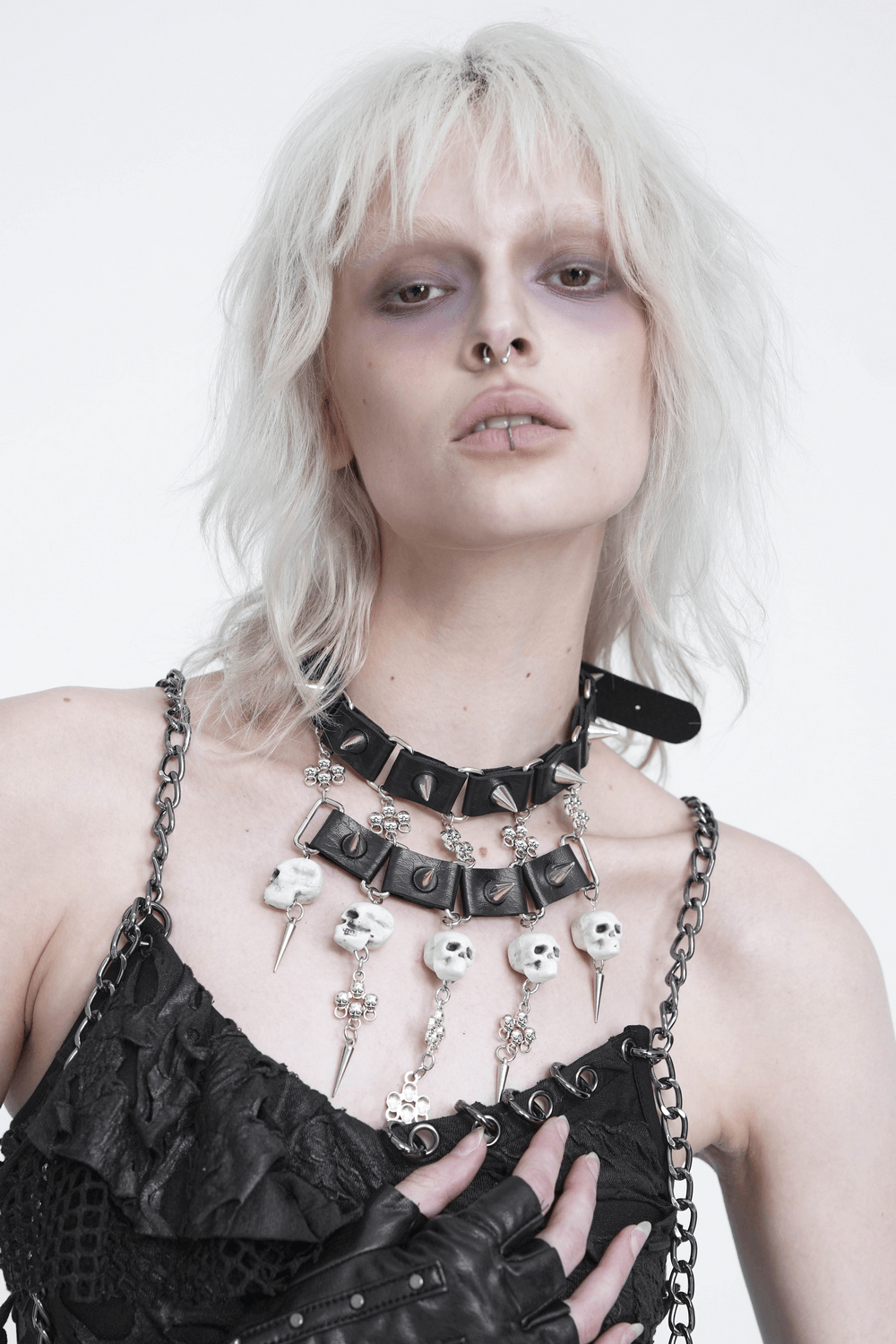 Gothic Skull Black Choker with Spikes and Chains worn by model, featuring spikes and layered chains.