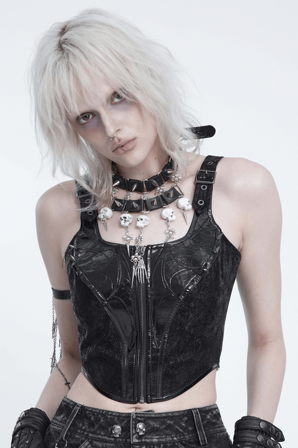 Gothic Skull Black Choker with Spikes and Chains worn with a stylish black crop top and outfit.