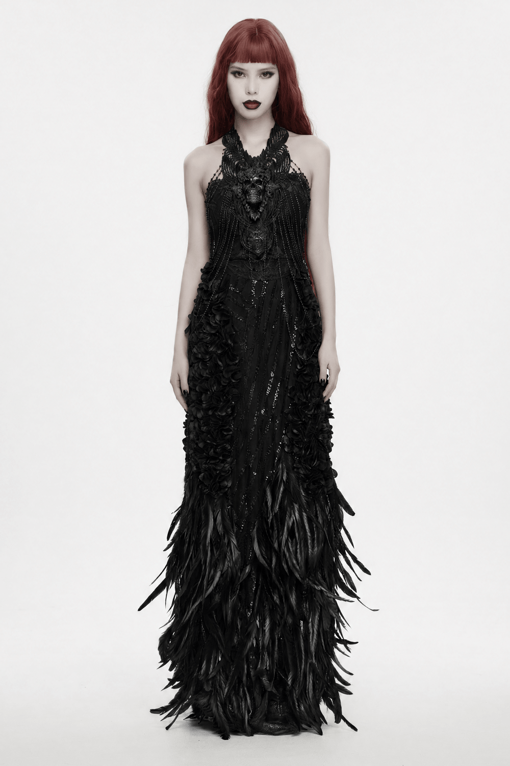 Gothic Skull Chain Body Harness with Lace Details worn by model in dramatic black dress with feather and flower details.