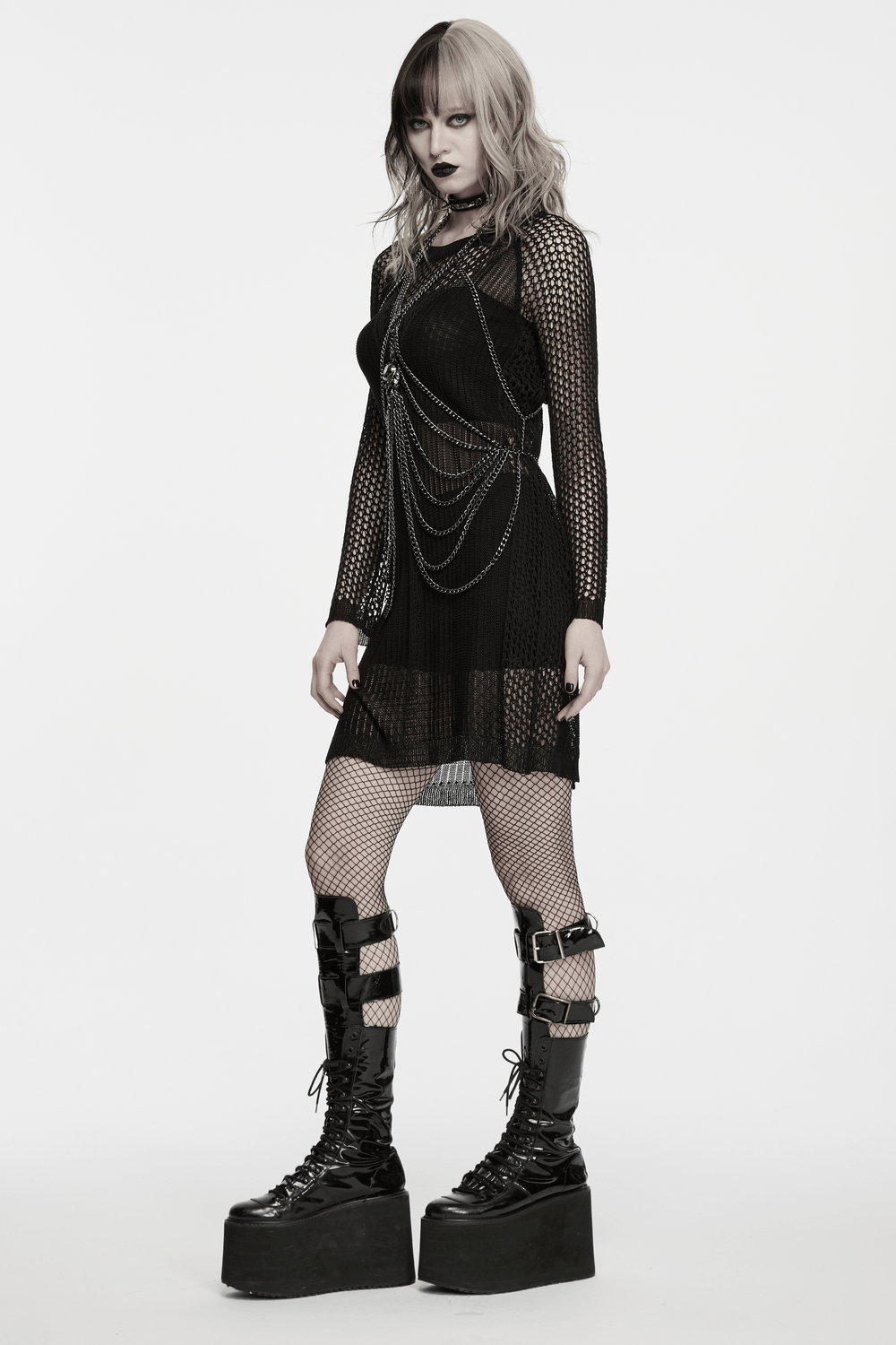 Gothic Skull Draped Body Chain Harness Jewelry worn with fishnet dress and platform boots, showcasing punk style and edgy fashion.