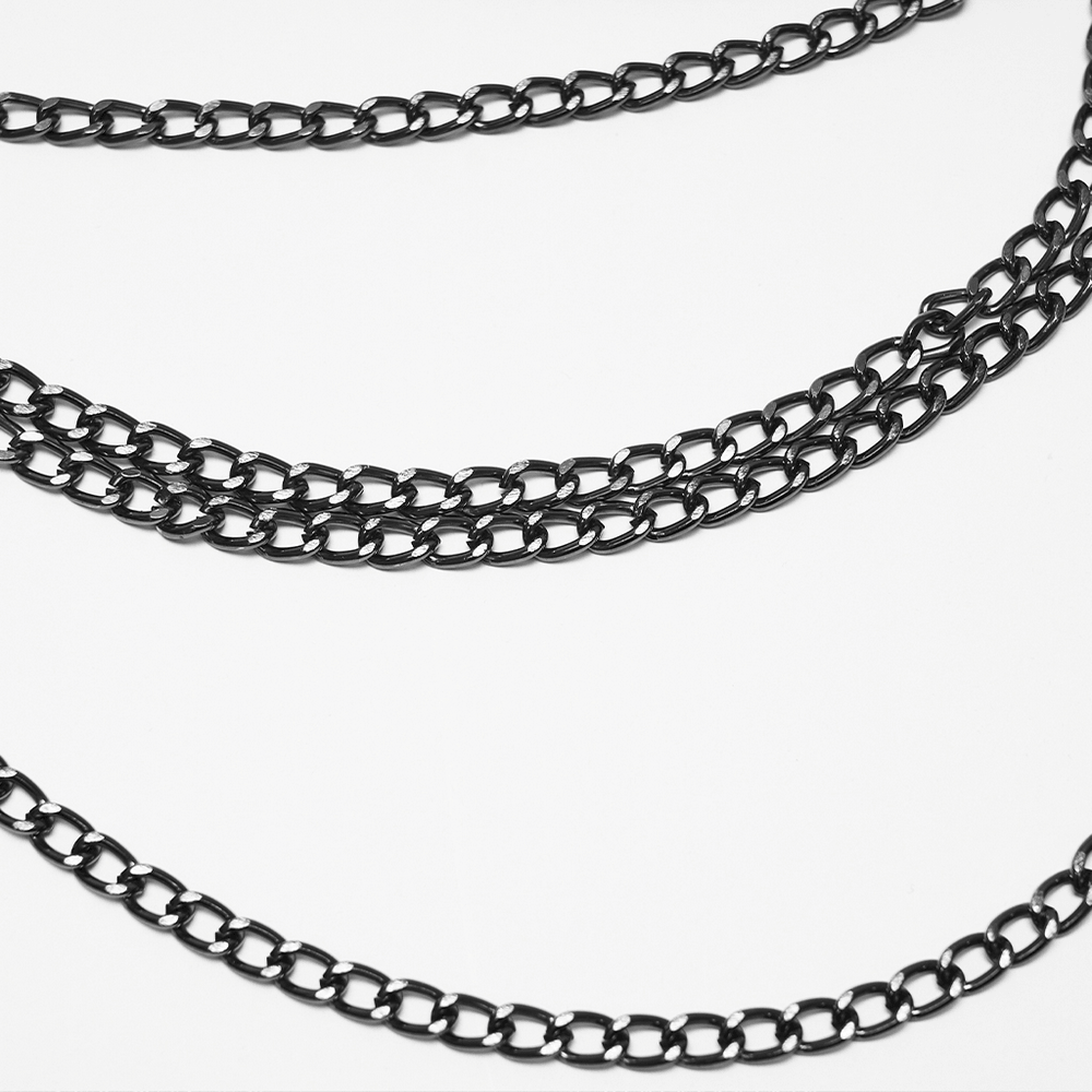 Gothic Skull Draped Body Chain Harness Jewelry showcasing antique-tone layered chains.