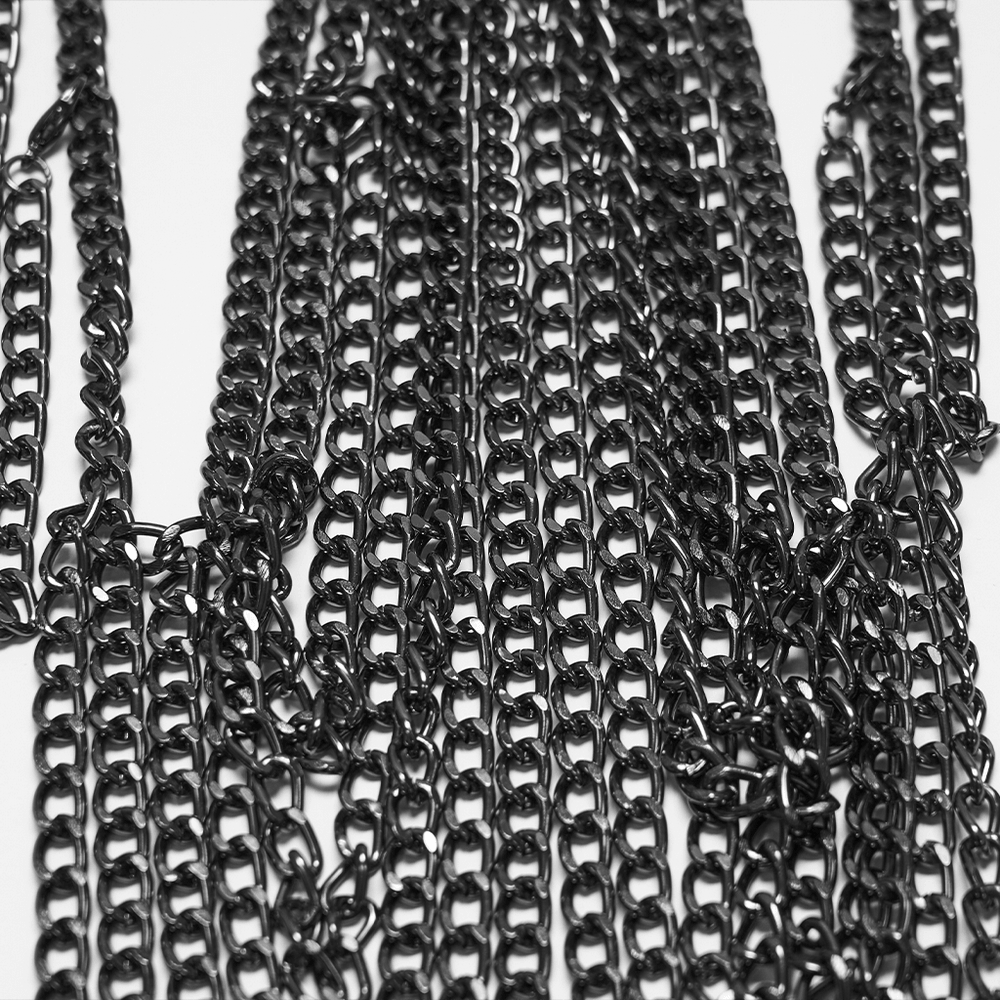 Gothic Skull Draped Body Chain Harness Jewelry featuring antique-tone chains in a layered design.