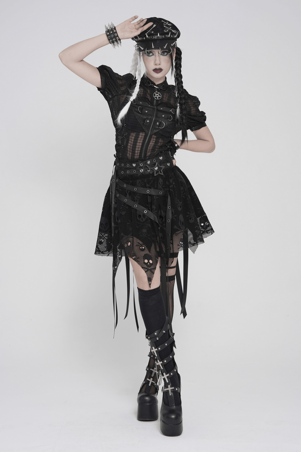 Gothic Skull Lace Mini Skirt with Strap Details worn by model with gothic accessories and bold styling.