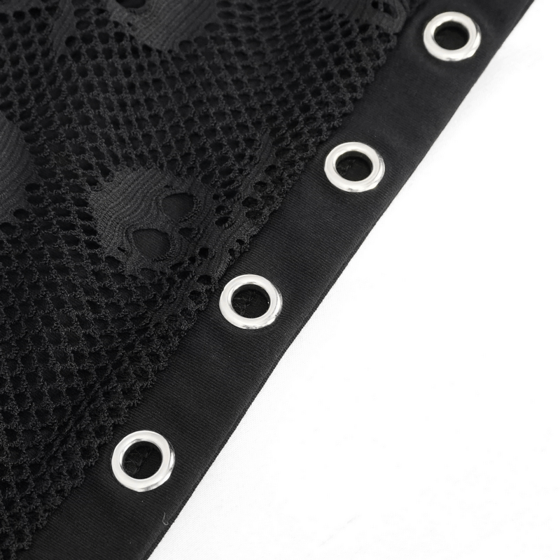 Close-up of black mesh fabric with skull print and silver grommets for gothic crop top design.