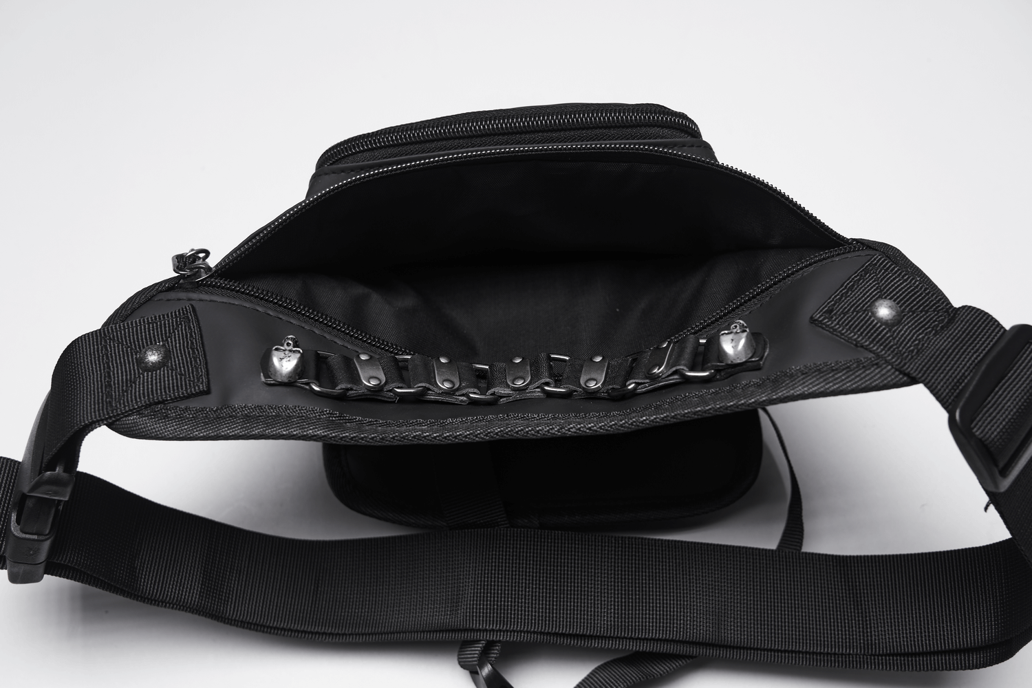 Gothic skull waist and leg bag interior showing pockets and chains, perfect for edgy style.