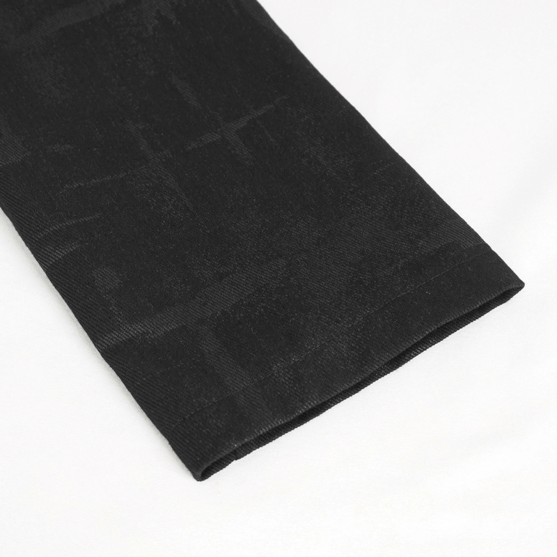 Close-up of the sleeve hem of a black gothic coat, showcasing textured fabric and unique design.