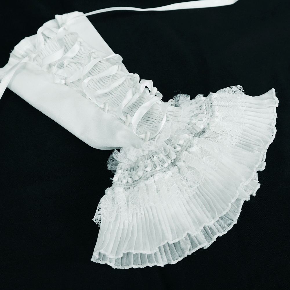 Gothic sleeveless blouse with wavy ruffles and vintage lace details in white.