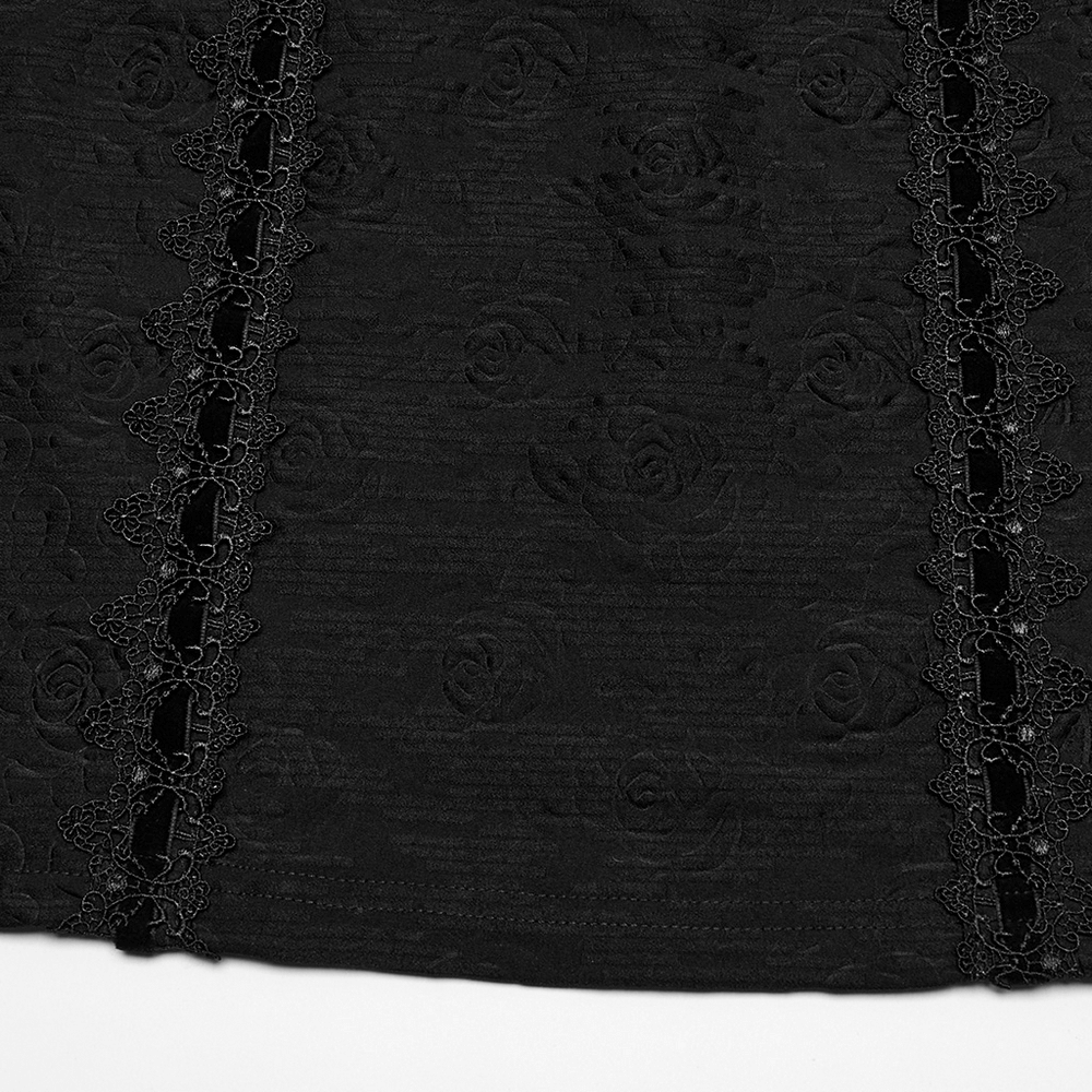 Close-up of black gothic fabric with rose pattern and intricate lace trim, showcasing elegant details for a cheongsam dress.